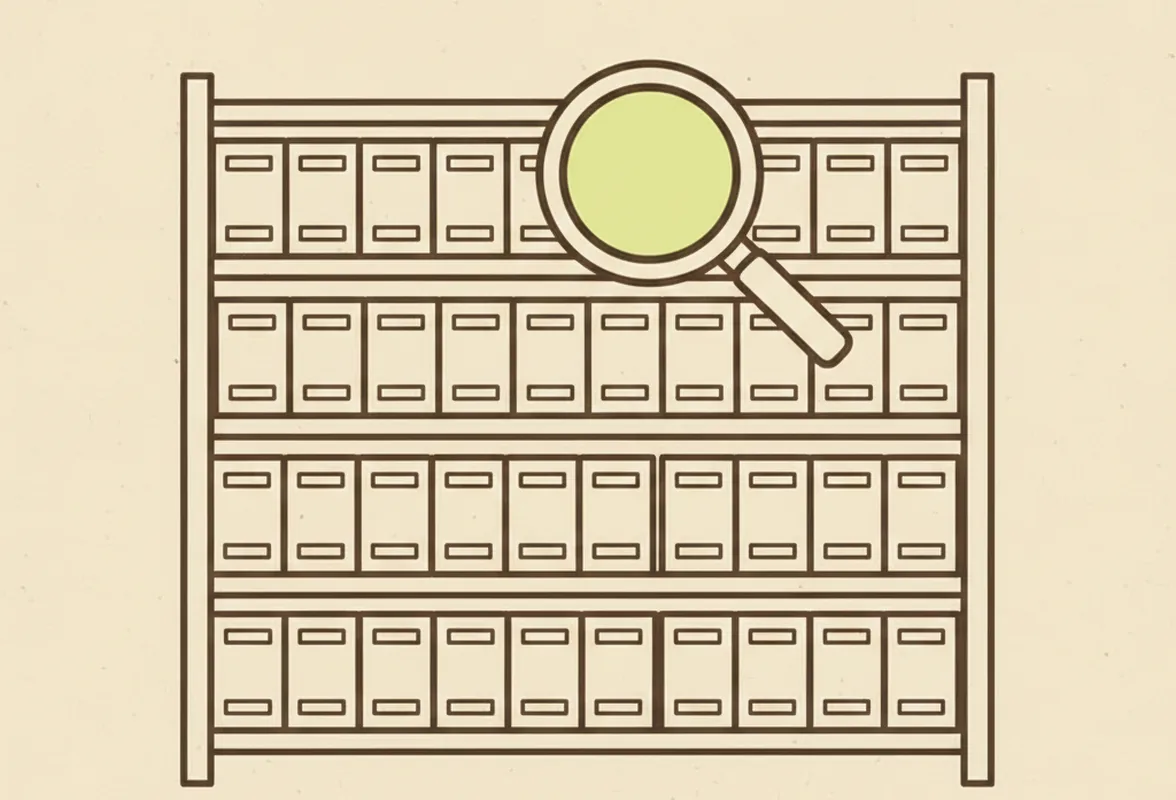 A shelf of archive boxes with a magnifier held over one of them